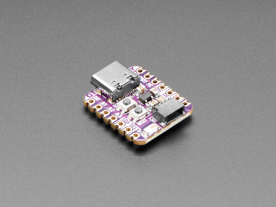 An Adafruit QT Py. Same shape as a XIAO but has a purple PCB